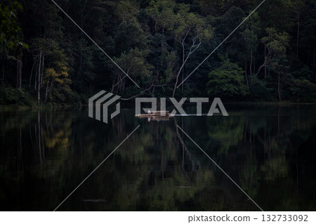 Pang Ung, located in Mae Hong Son Province, is a famous natural tourist attraction due to its beautiful scenery of a large reservoir surrounded by mountain pine forests. 132733092