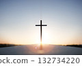 Rising New Year sunrise and the Holy Cross of Jesus Christ, with bright sky and shining sun in the background 132734220