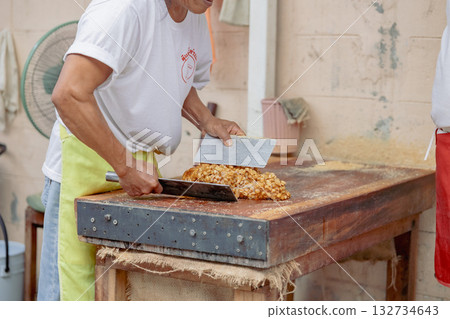 Kinjay, the peanut candy maker Kinjay, the peanut candy maker 132734643