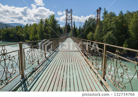 Perspective view of a cable-stayed bridge over Katun river, Altai Republic, Russia Perspective view of a cable-stayed bridge over Katun river, Altai Republic, Russia 132734766
