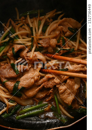 Pork chive bean sprouts being cooked 132736449