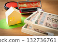 Real estate, a stack of bills and a stamp 132736761