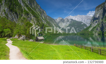 Mountain valley with tracks near Obersee lake in Berchtesgaden National Park Mountain valley with tracks near Obersee lake in Berchtesgaden National Park 132736980