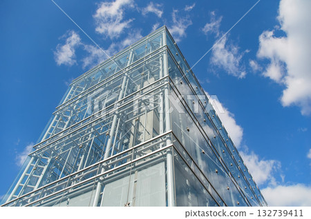 Okazaki City Museum of Art: Modern glass architecture and panoramic views against the blue sky Okazaki City Museum of Art: Modern glass architecture and panoramic views against the blue sky 132739411