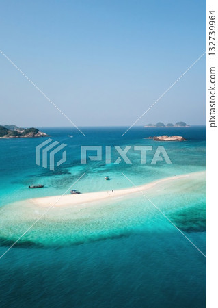 A beautiful tropical island with clear blue waters and a sandy beach. Redang Island in Malaysia 132739964