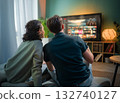 family watching  TV at home 132740127