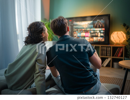 family watching  TV at home 132740127