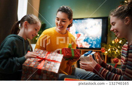 family celebrating Christmas family celebrating Christmas 132740165