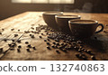 Coffee cups with latte art surrounded by roasted beans 132740863