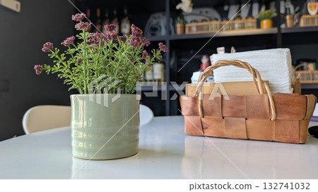 A Charming and Beautiful Indoor Plant Arrangement Gracefully Displayed on a Modern Table A Charming and Beautiful Indoor Plant Arrangement Gracefully Displayed on a Modern Table 132741032
