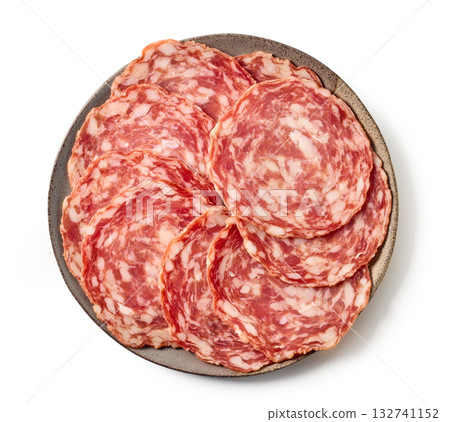 plate of sliced dry spanish sausages isolated on white background 132741152