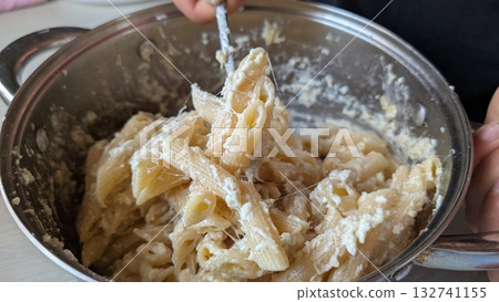 Creamy Pasta Dish Cooked in a Pot Great for Food Enthusiasts and Cuisine Lovers 132741155