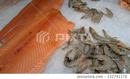 Introducing a Fresh Seafood Selection Featuring Delicious Salmon and Tasty Shrimp Dishes 132741178