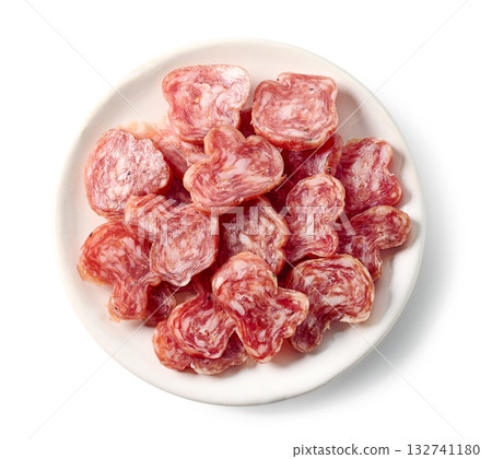 plate of sliced dry spanish sausages 132741180