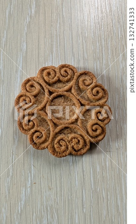 An Elegant and Decorative Traditional Pastry Featuring Intricate and Detailed Patterns An Elegant and Decorative Traditional Pastry Featuring Intricate and Detailed Patterns 132741333