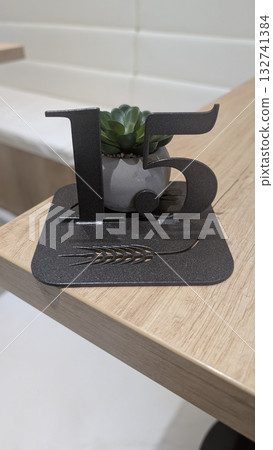 Stylishly designed Decorative Table Number featuring a beautiful Succulent Plant accent Stylishly designed Decorative Table Number featuring a beautiful Succulent Plant accent 132741384