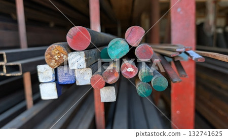 A Variety of Colorful Metal Rods and Bars Available Now in Our Stock Storage Facilities A Variety of Colorful Metal Rods and Bars Available Now in Our Stock Storage Facilities 132741625