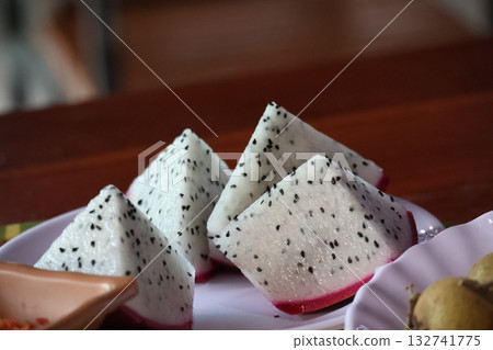Close-up view of sliced dried fruits on a plate 132741775