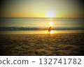 Boys playing against the backdrop of a beautiful Balinese sunset 132741782