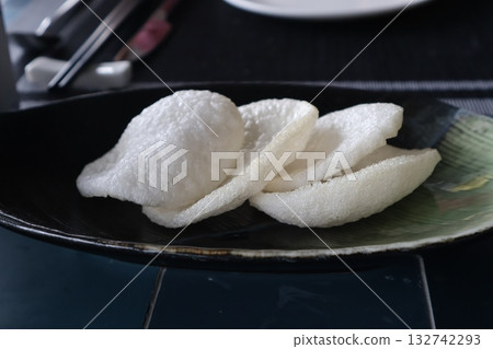 A scene of Krupuk on a plate 132742293