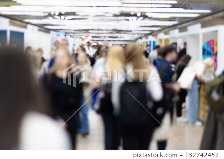 Abstract blurred people at exhibition hall of expo event trade show. Business convention show or job fair. Business concept background. 132742452