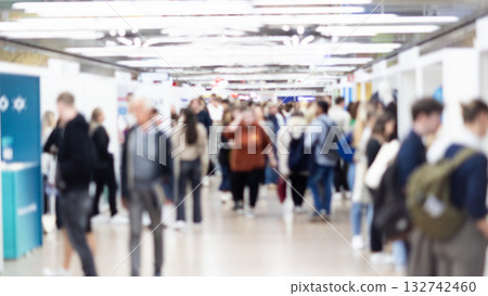 Abstract blurred people at exhibition hall of expo event trade show. Business convention show or job fair. Business concept background. Abstract blurred people at exhibition hall of expo event trade show. Business convention show or job fair. Business concept background. 132742460