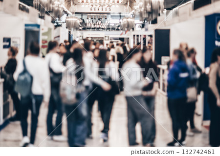 Abstract blurred people at exhibition hall of expo event trade show. Business convention show or job fair. Business concept background. 132742461