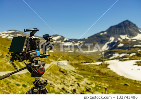 Camera taking photo in mountains, Norway Camera taking photo in mountains, Norway 132743496