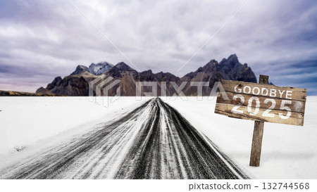 Street toward the hills with a signboard with a greeting of Goodbye 2025. Happy New Year concept or Celebration Street toward the hills with a signboard with a greeting of Goodbye 2025. Happy New Year concept or Celebration 132744568