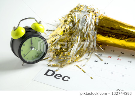 Calendar showing 1st January 2026 as the new year with an alarm clock and party horn. Happy New Year concept or Celebration Calendar showing 1st January 2026 as the new year with an alarm clock and party horn. Happy New Year concept or Celebration 132744593