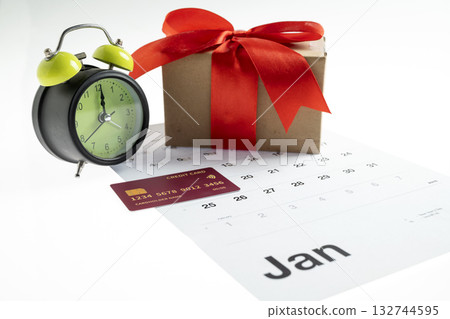 Calendar showing 1st January 2026 as the new year with an alarm clock, credit card, and gift box. Happy New Year concept or Celebration Calendar showing 1st January 2026 as the new year with an alarm clock, credit card, and gift box. Happy New Year concept or Celebration 132744595