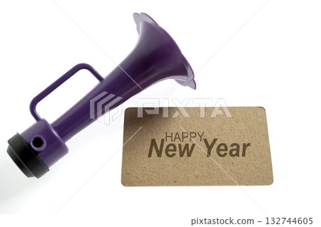 Greeting card of Happy New Year with a plastic horn. Mockup or Copy space. Happy New Year concept or Celebration 132744605