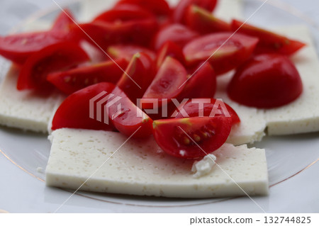 Traditional sheep cheese with tomatoes.. Traditional sheep cheese with tomatoes.. 132744825