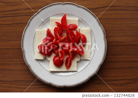 Traditional sheep cheese with tomatoes.. 132744826