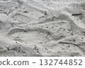 Footprint of shoe in the white sand. 132744852