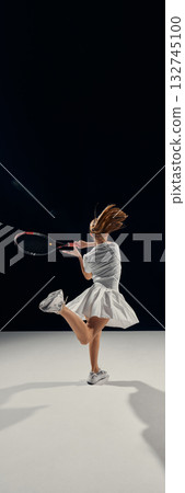 Teenage girl hitting tennis ball midair with strength and control. Vertical flyer Teenage girl hitting tennis ball midair with strength and control. Vertical flyer 132745100