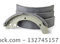 Brake pads drums close-up on a white. Isolated 132745157