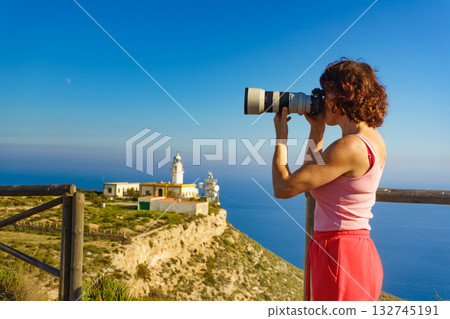 Tourist take photo at lighthouse, Cabo de Gata, Spain 132745191