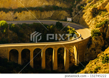 Road and viaduct from Granatilla viewpoint, Spain 132745222