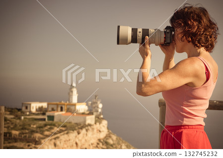 Tourist take photo at lighthouse, Cabo de Gata, Spain 132745232