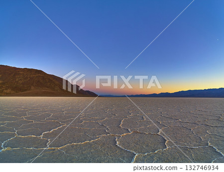Salt Flats Landscape at Golden Hour with Mountains and Expansive Sky Salt Flats Landscape at Golden Hour with Mountains and Expansive Sky 132746934