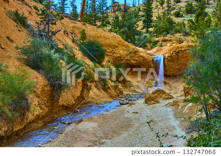 Tropic Ditch Falls Waterfall with Stream and Red Rock Cliffs on Mossy Cave Trail Tropic Ditch Falls Waterfall with Stream and Red Rock Cliffs on Mossy Cave Trail 132747068