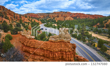Aerial Red Canyon Hoodoo and Scenic Highway with Pine Forest Utah Aerial Red Canyon Hoodoo and Scenic Highway with Pine Forest Utah 132747080