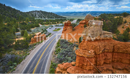 Aerial Red Canyon Hoodoo Formations and Scenic Road in Utah Forest Aerial Red Canyon Hoodoo Formations and Scenic Road in Utah Forest 132747156