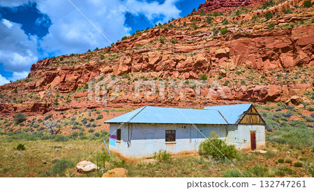 Abandoned White Brick House and Red Rock Cliffs in Kanab Utah Aerial Abandoned White Brick House and Red Rock Cliffs in Kanab Utah Aerial 132747261