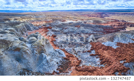 Aerial Painted Desert Multicolored Rock Formations and Eroded Badlands Arizona 132747487