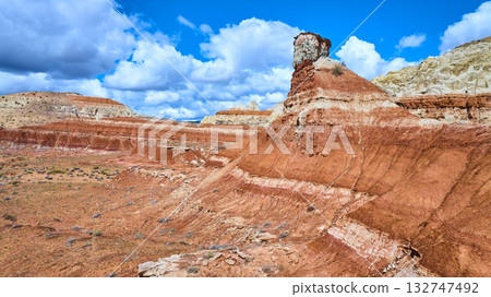 Aerial Desert Badlands with Layered Rock Formations and Toadstool Hoodoo Utah 132747492