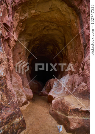 Sandstone Cave Entrance with Graffiti and Shadows Belly of the Dragon Utah Sandstone Cave Entrance with Graffiti and Shadows Belly of the Dragon Utah 132747533
