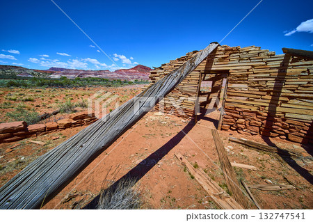 Abandoned Stone Movie Set Ruin in Utah Desert with Sandstone Mesas 132747541