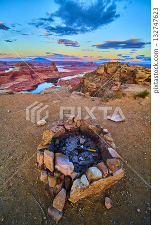 Campfire Ring Overlooking Lake Powell and Desert Mesas at Golden Hour Campfire Ring Overlooking Lake Powell and Desert Mesas at Golden Hour 132747623